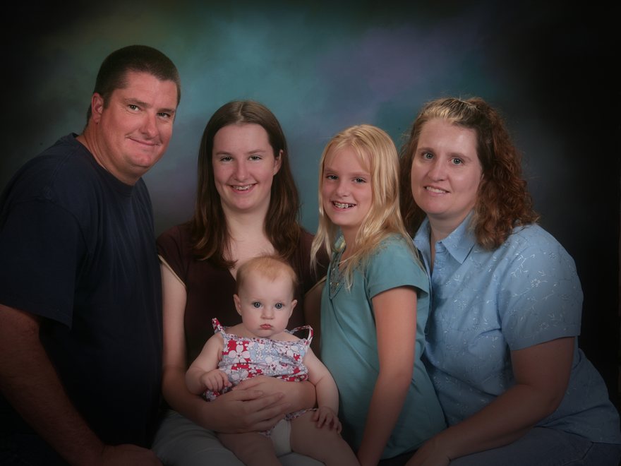 Studio portrait of a family of five